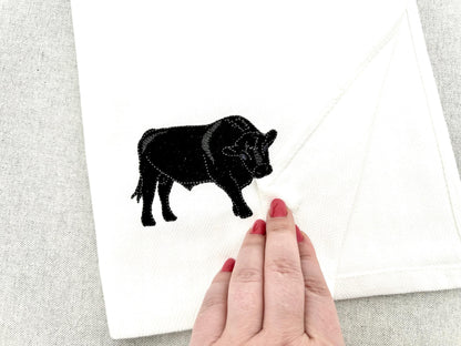 Playing Black Angus Bull