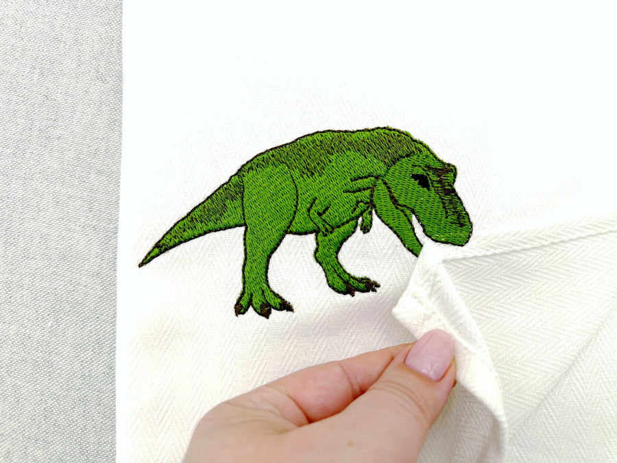 Naughty Playing Trex Dinosaur stealing kitchen dish towel Jurassic wild animal thief kids machine embroidery designs ITH