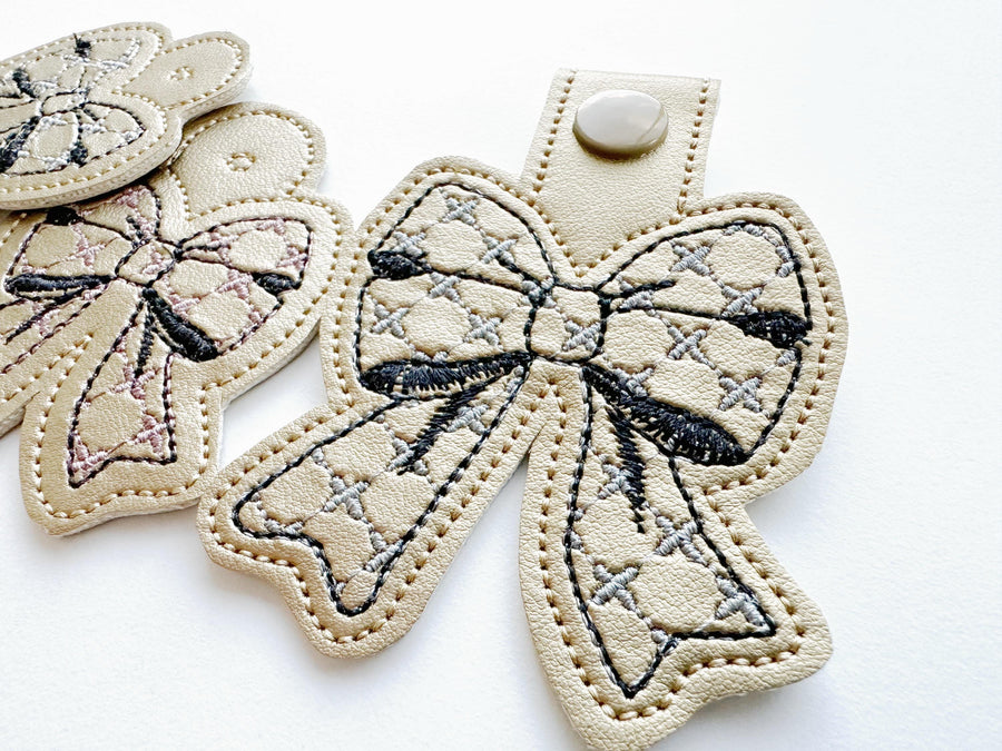 Chic Mini Bow Eyelet and Key Fob snap tab keychain ITH in the hoop machine embroidery designs