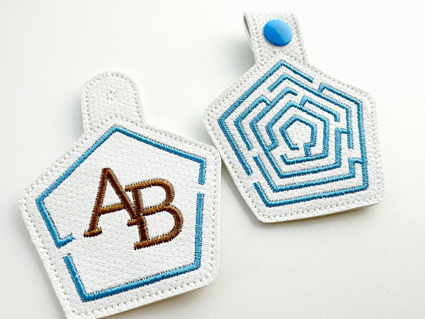 Pentagon Labyrinth frame and initial Monogram Eyelet and Key Fob snap tab in the hoop ITH keychain machine embroidery designs