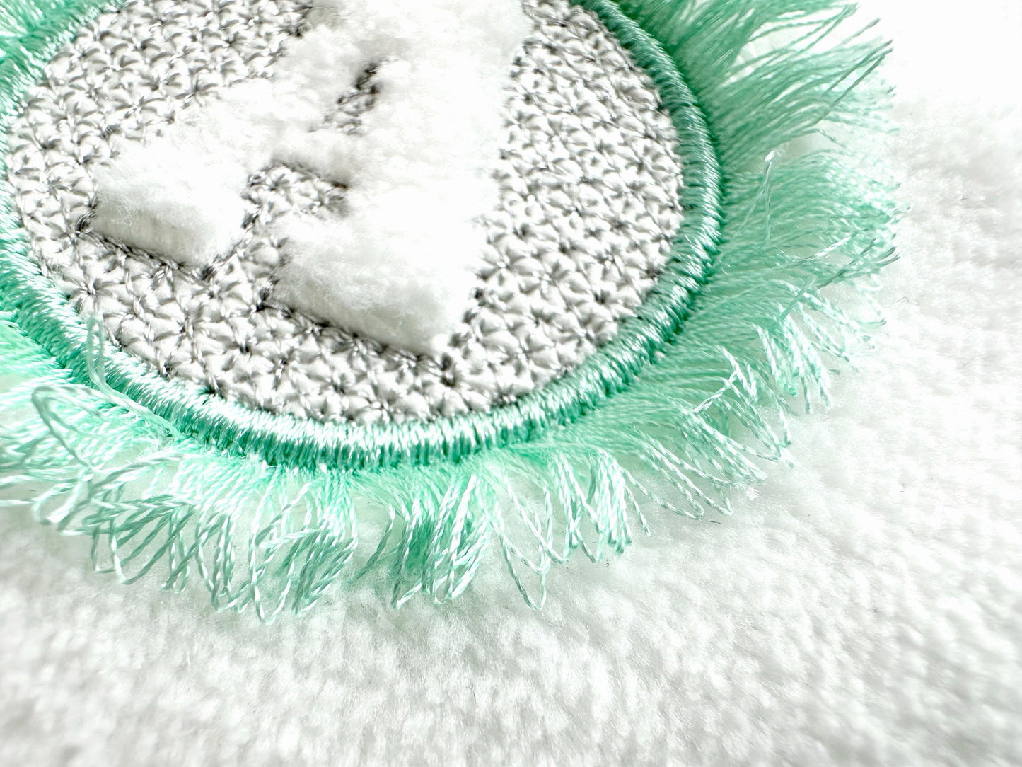 Embossed Monogram Fringed Frame