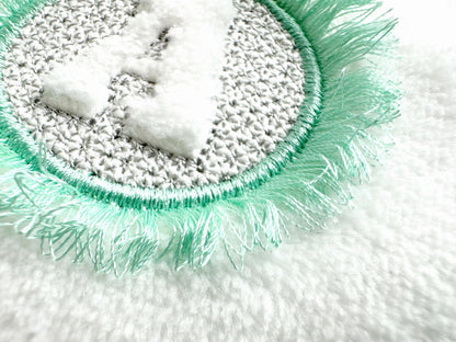 Embossed Monogram Fringed Frame