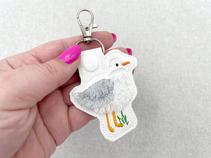 Fringed Seagull Eyelet and Key Fob snap tab in the hoop machine embroidery designs wild sea bird beach fringe keychain gift idea ITH project