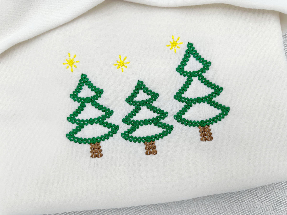 Árboles de Navidad del bosque con efecto de hilo grueso