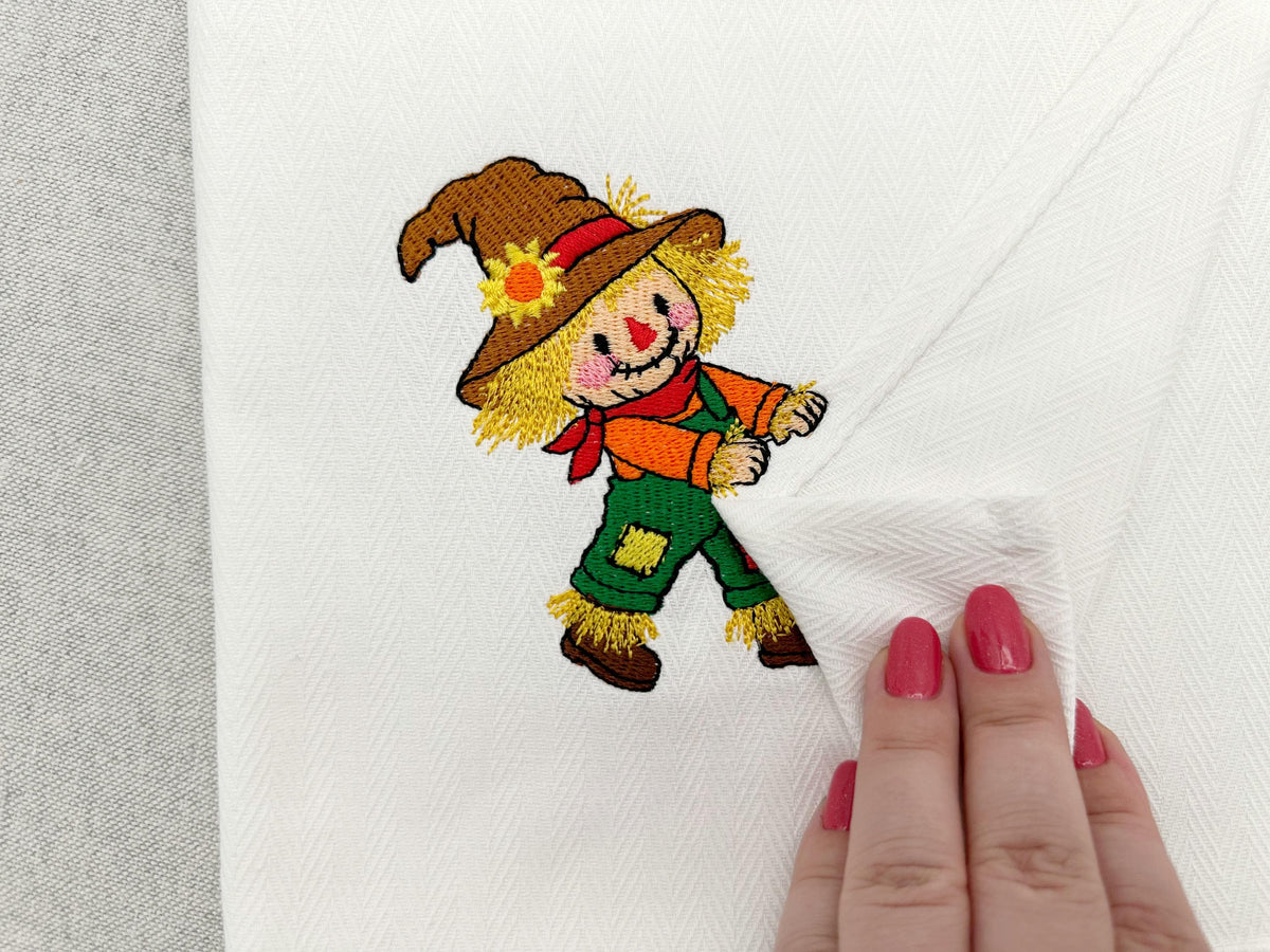 Playful Scarecrow Towel Thief