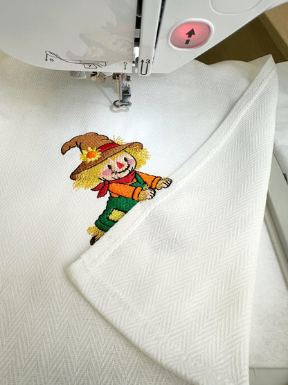 Playful Scarecrow Towel Thief