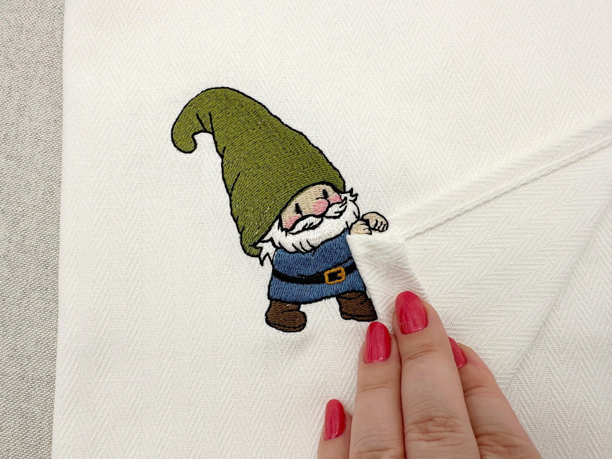 Gnome coquin voleur de torchon