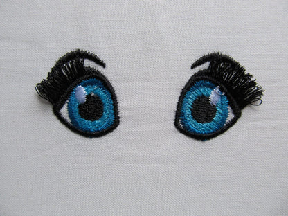 Fringed, fluffy, flare lashes dolls – Doll machine embroidery design by Artapli